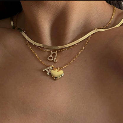 Collier lettre et médaillon cœur